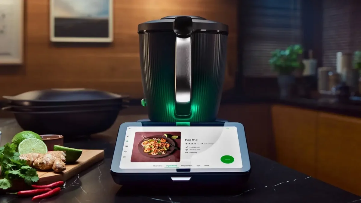 Thermomix TM7 showing a Pad Thai recipe on its touchscreen, on a kitchen countertop.